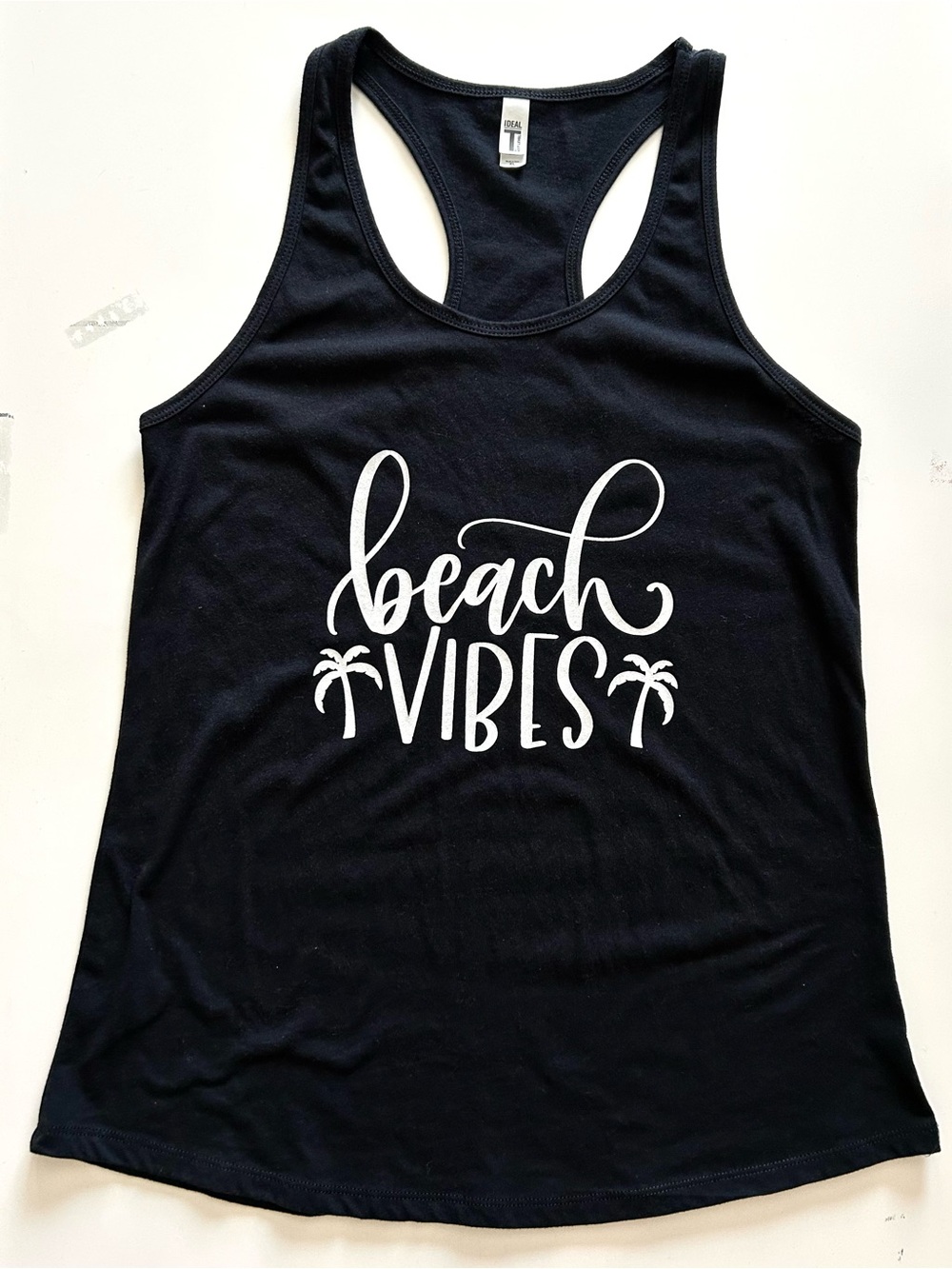 Beach Vibes Women’s Black Racerback Tank Top with White Graphics